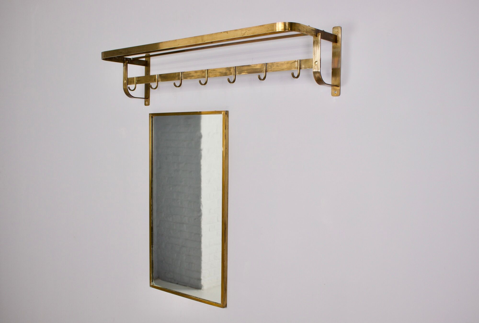 Vereinigte Werkstätten, brass cloakroom and mirror