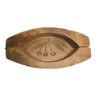 old wooden butter mold