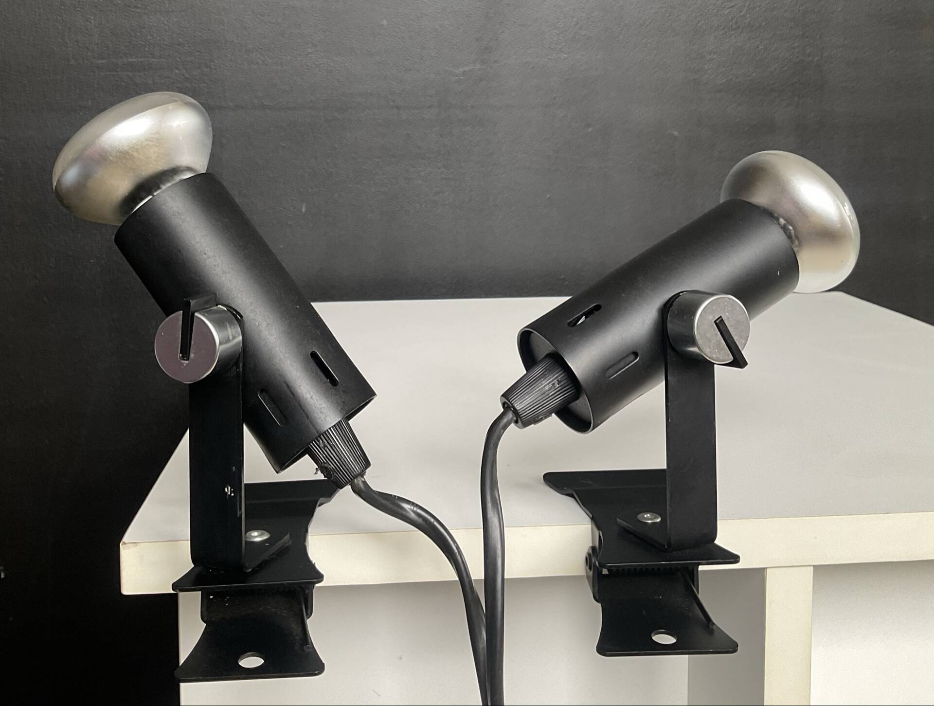 A pair of clamp lamps from the 1970s.