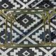 Nested table in gold metal and glass