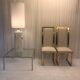Set of 2 Michel Mangematin chairs in brass and virgin wool.