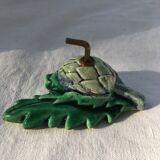 Lot of slurry hooks in the shape of plants and animals
