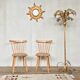 Pair of Scandinavian chair fabric light wood flower feet compasses