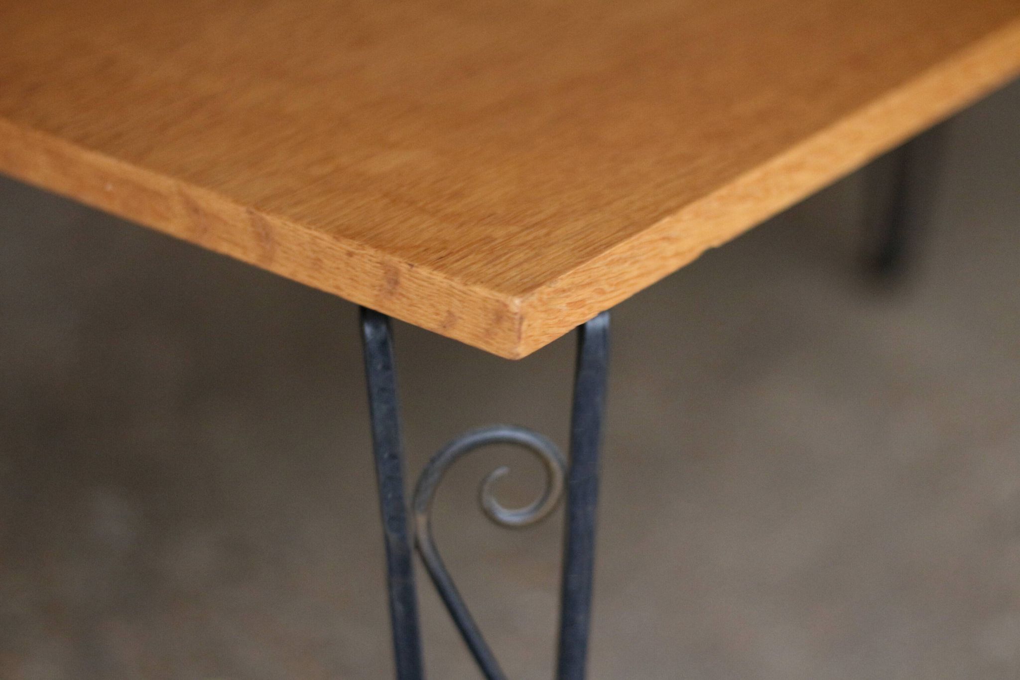 Nice vintage coffee table (1970s). Made of plywood and cast iron.