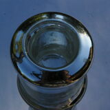 Candle holder in eglomerized glass