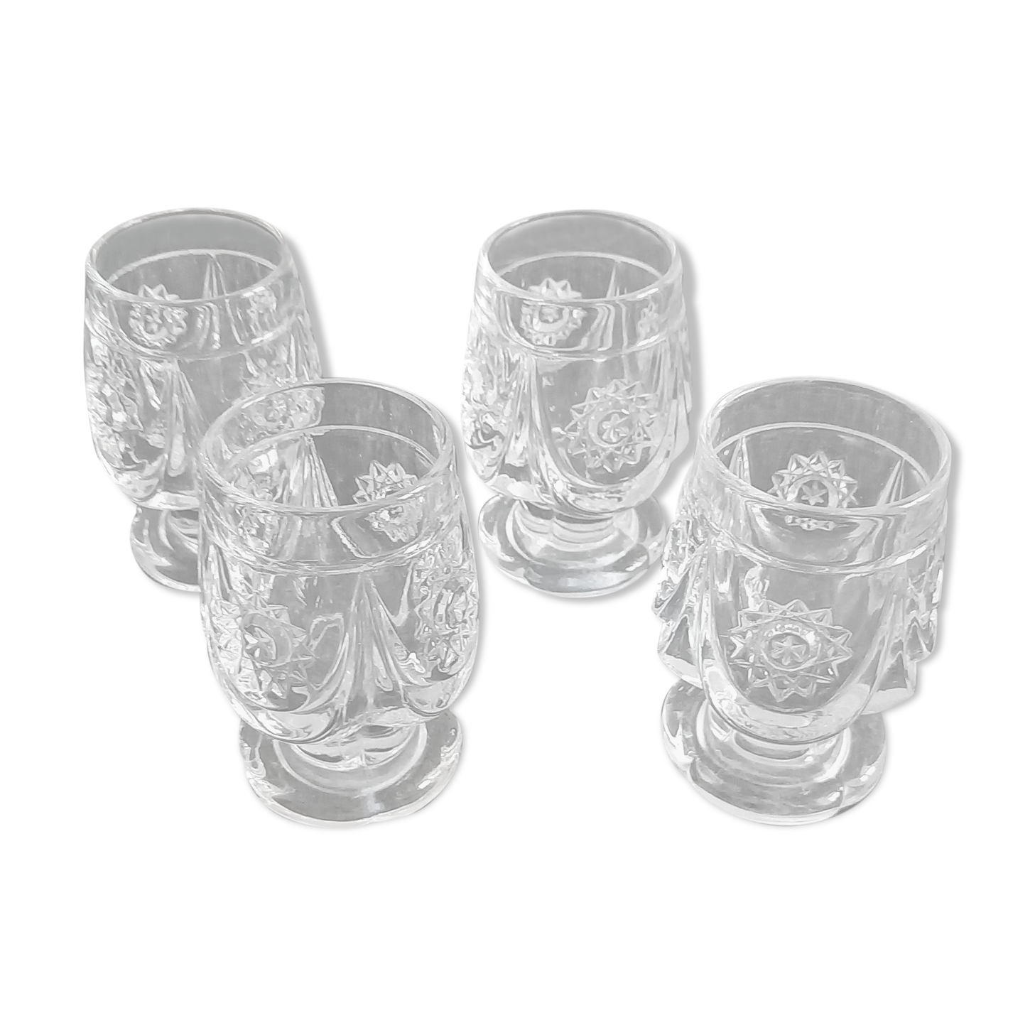 4 antique to digestive glasses in cut crystal and molded crystal decorated