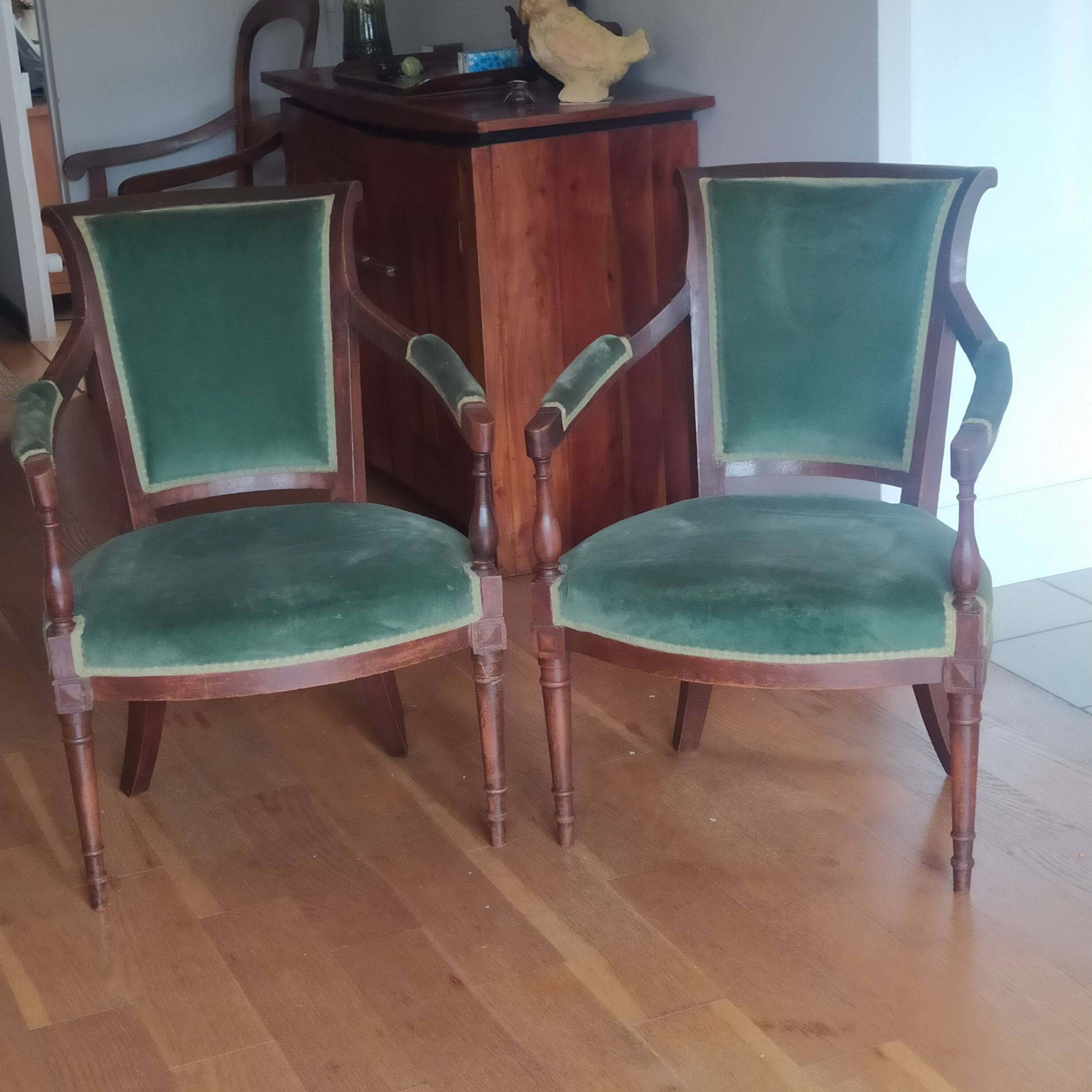 pair of Directoire armchairs in walnut, early 19th century, green velvet