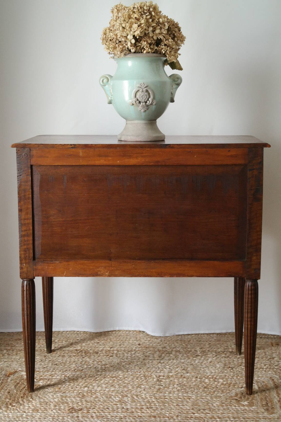 Solid walnut chest of drawers from the early 20th century.