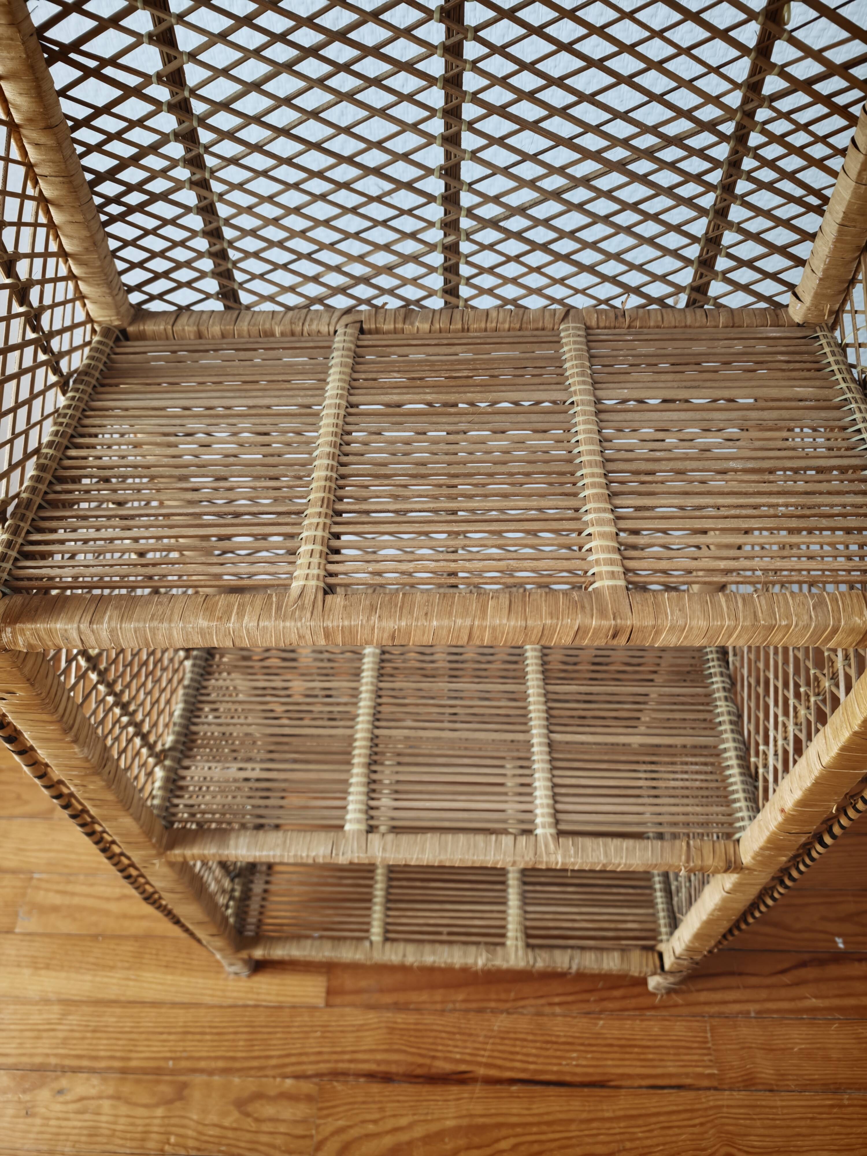 Rattan shelf on legs circa 1960