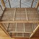 Rattan shelf on legs circa 1960