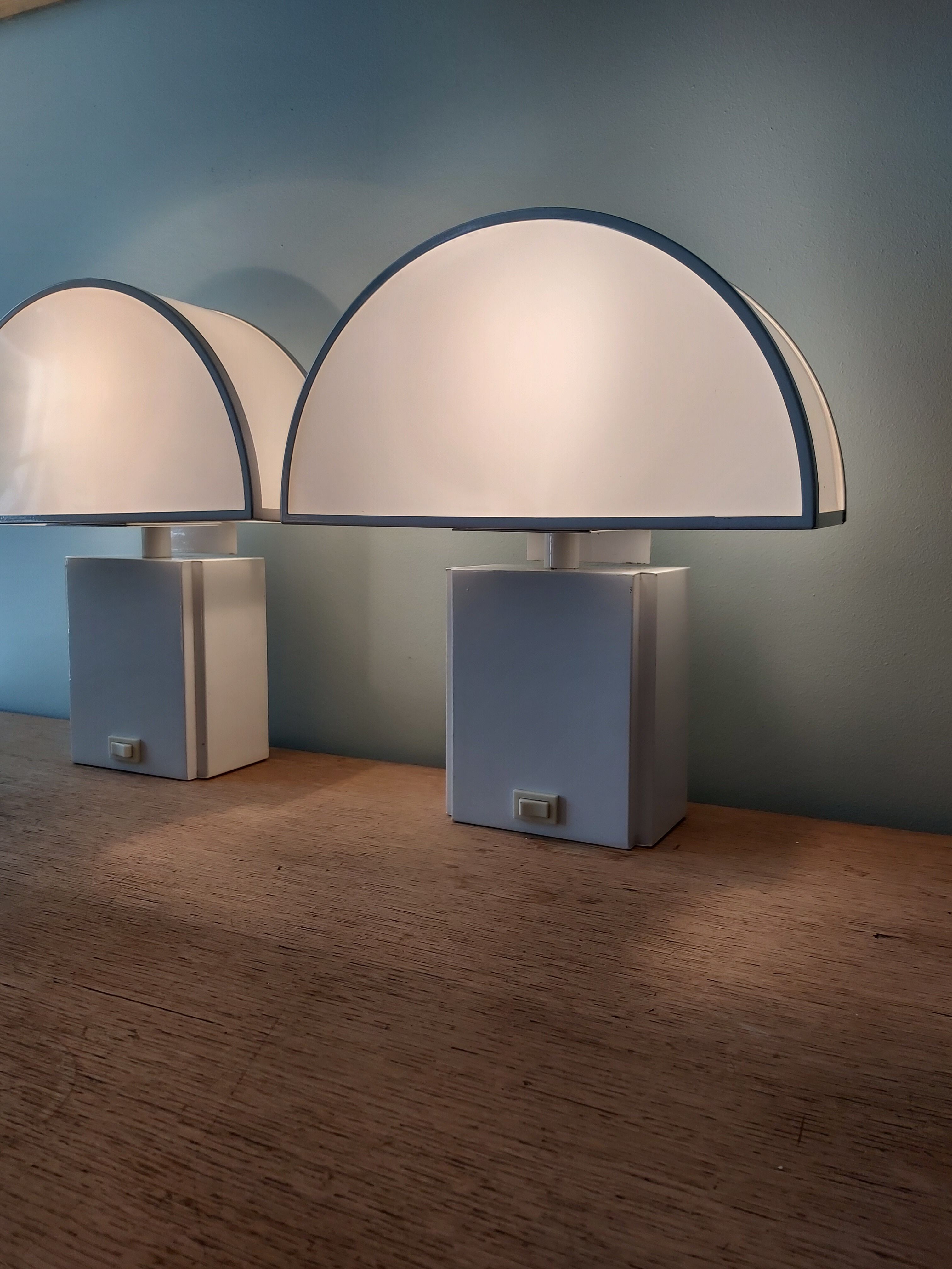 Pair of wall lamps, Olympus model, Harvey Guzzini, 70s