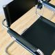 Pair of tubular armchairs in metal and leather Style Marcel Breuer