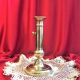 Gilded copper push candle holder