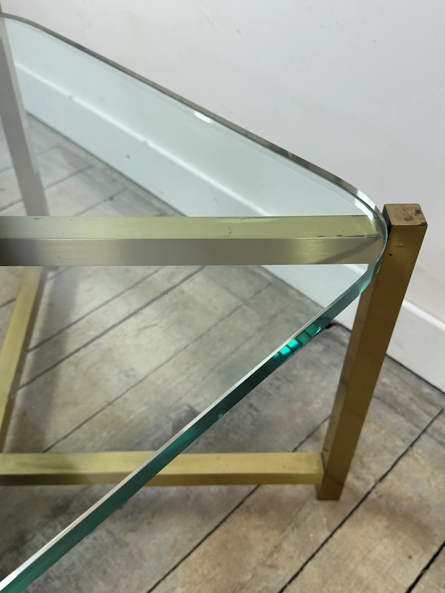 Pair of Italian brass and glass side tables from the 1970s.