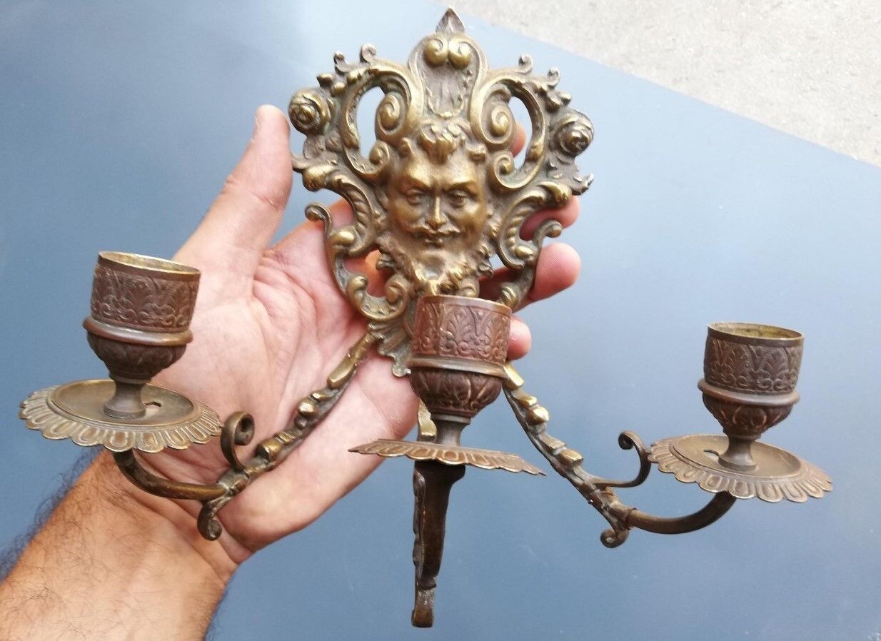 Pair of bronze candle holders