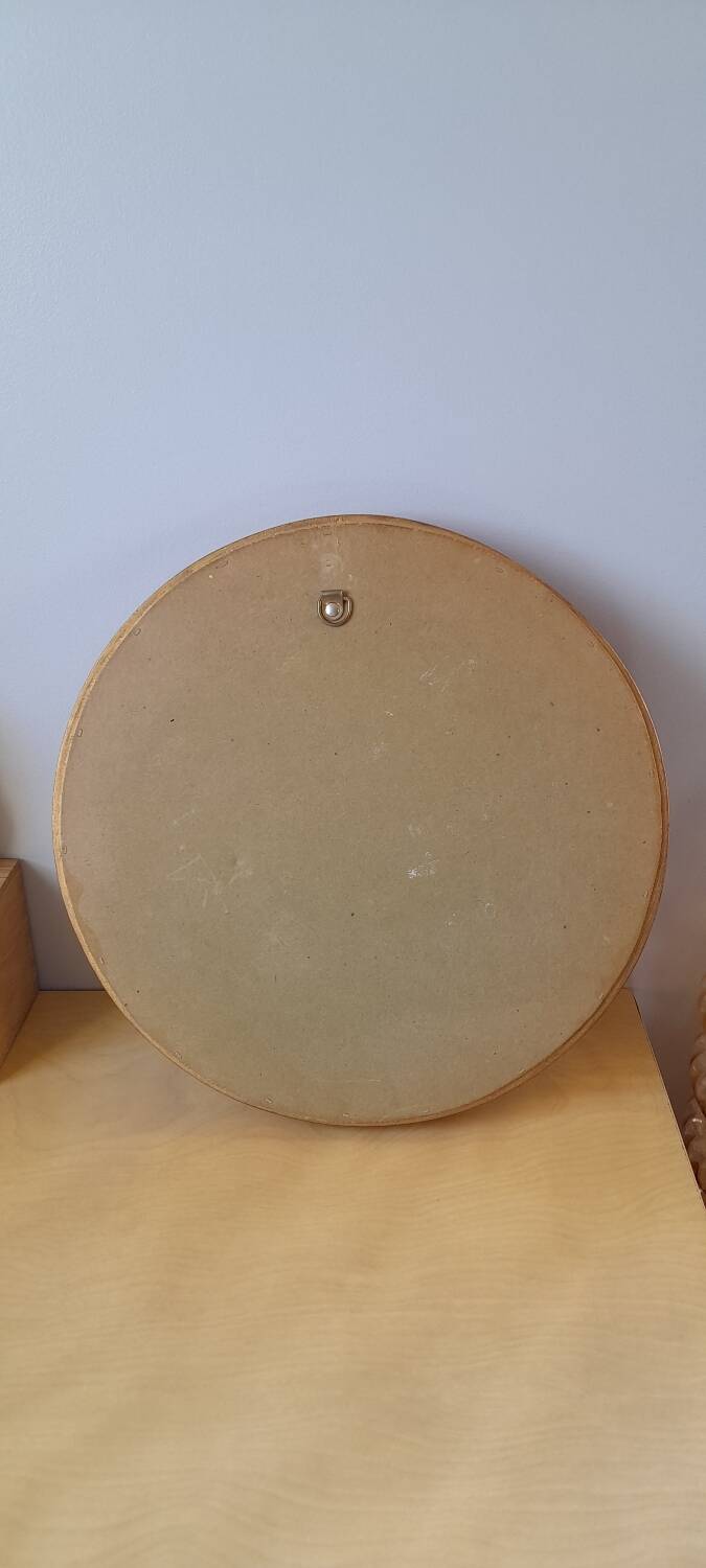 Round golden mirror, 1970.