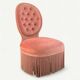 Fauteuil crapaud capitonné rose vintage