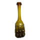 Carafe en verre enchâssée dans du fer forgé
