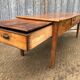 Antique farmhouse table in solid cherry wood with 3 drawers and 1 pull-out.