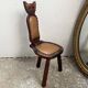 Folding tripod stool with cat back