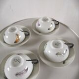 4 cups and cups in fine Limoges porcelain signed LC 60s