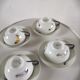 4 cups and cups in fine Limoges porcelain signed LC 60s