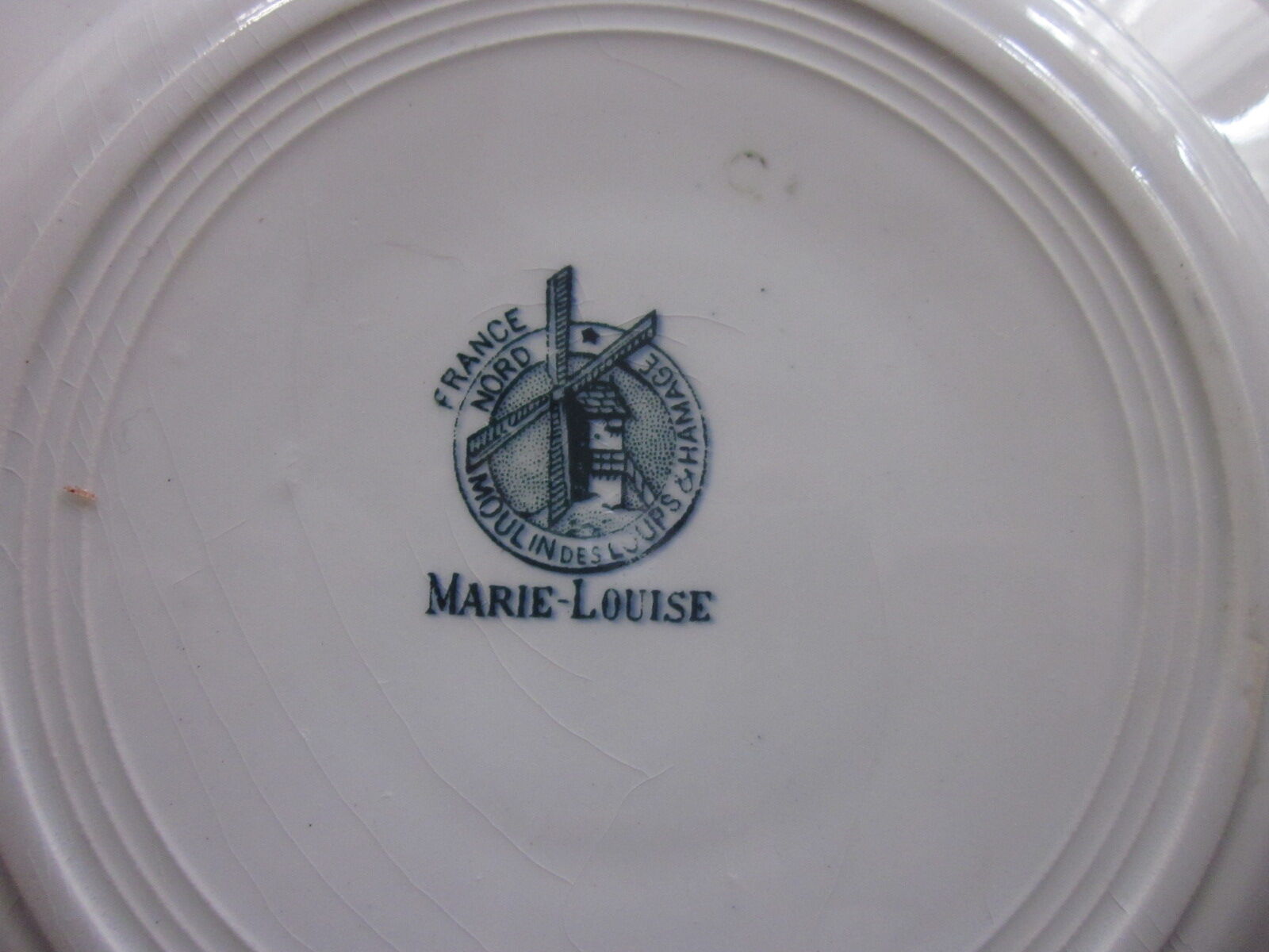Set de 8 assiettes marie louise en faience de st Amand