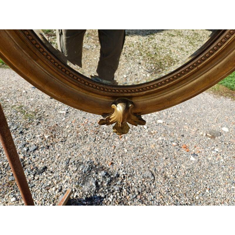 Miroir ovale en bois et stuc doré 19ème
