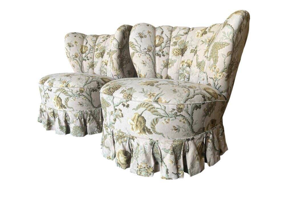 Set of 2 vintage floral patterned cocktail chairs.