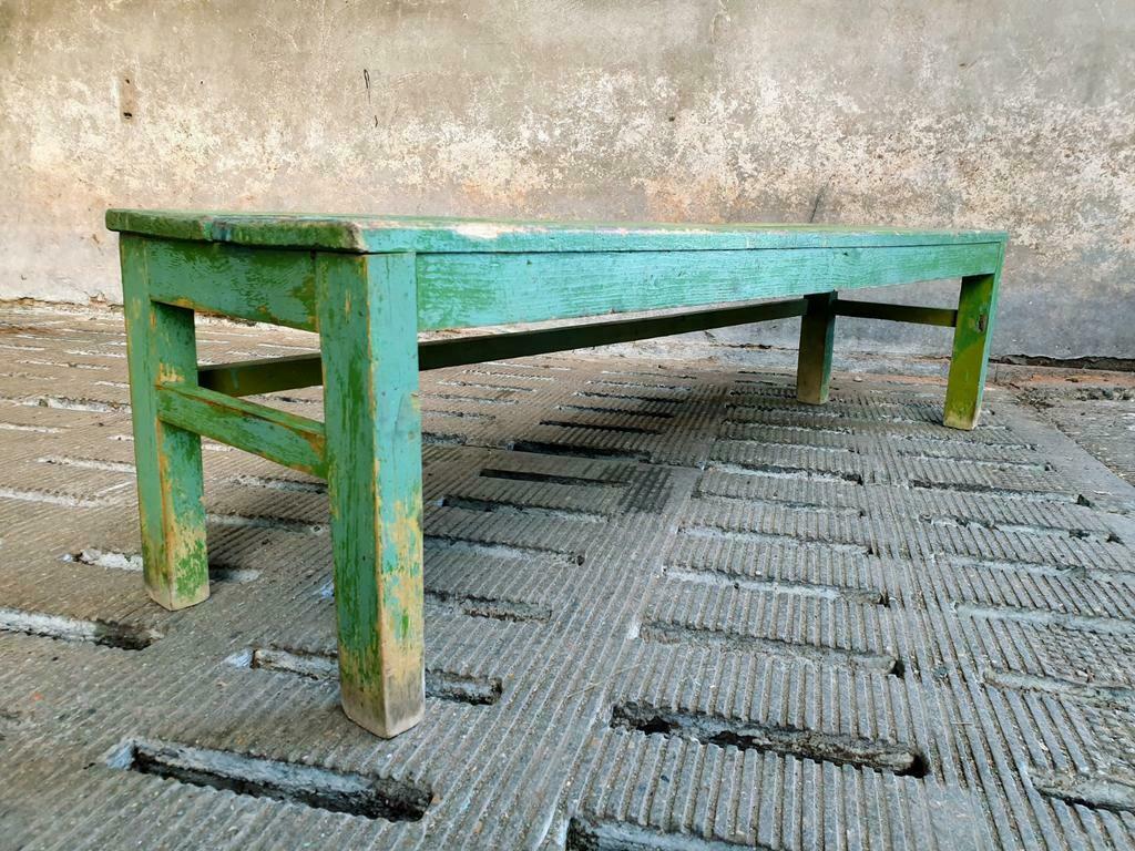 Old wooden bench sidetable green