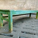 Old wooden bench sidetable green