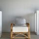 Large rattan rest chair and white cushions