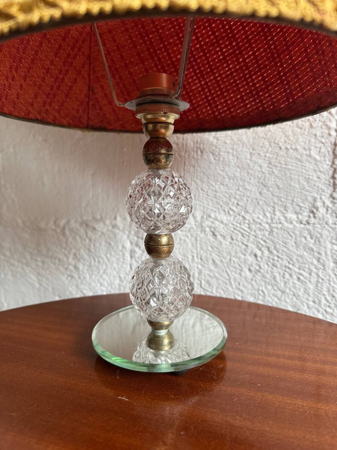 Small glass, mirror, and brass lamp from the 1960s.