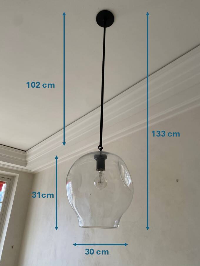 Suspension design by Lindsey Adelman studio in oil-rubbed bronze and clear glass.