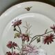 Set de 2 assiettes décor fleurs et abeilles, fin XIXème