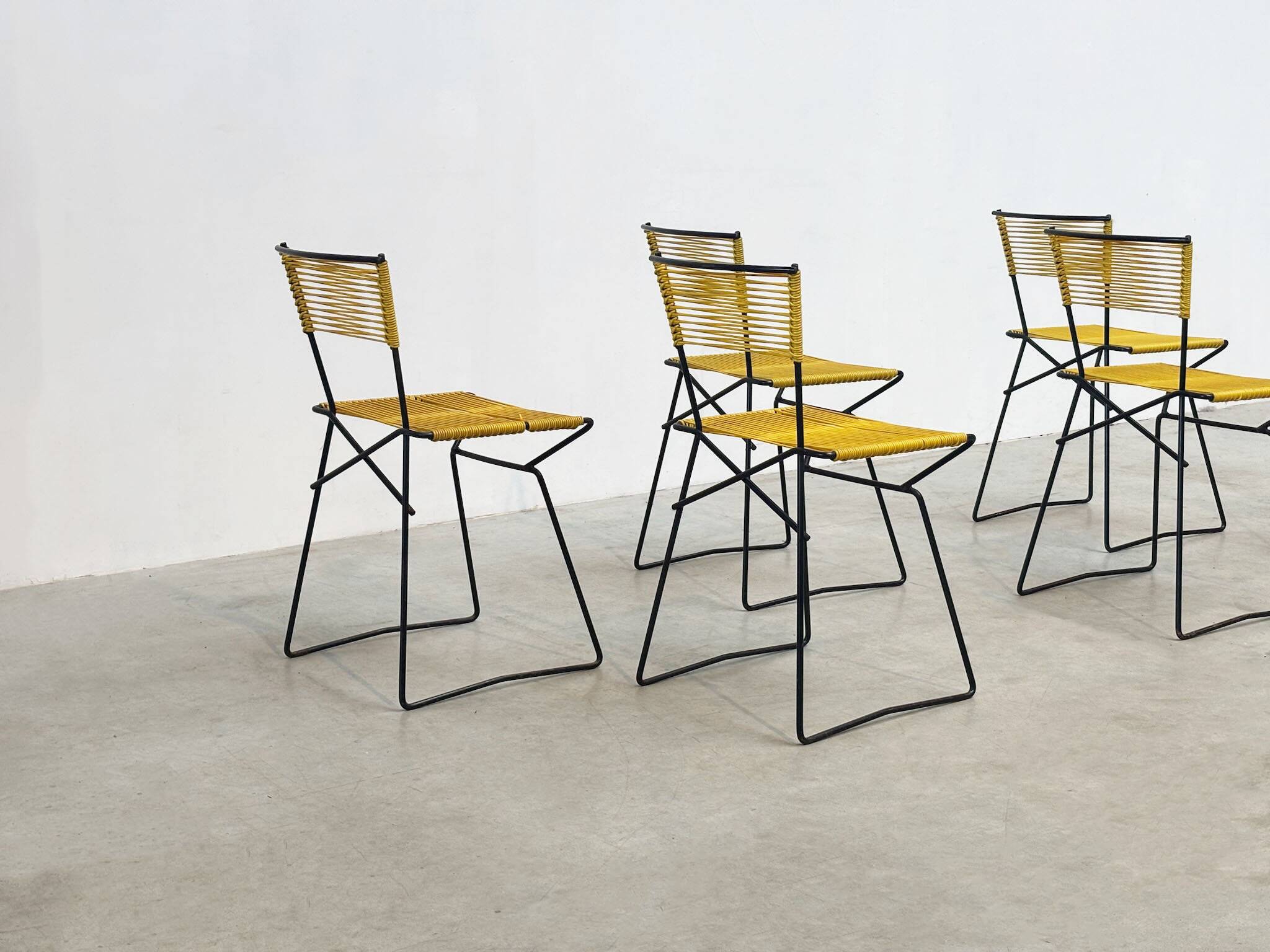 Set of six 'Spaghetti' dining chairs