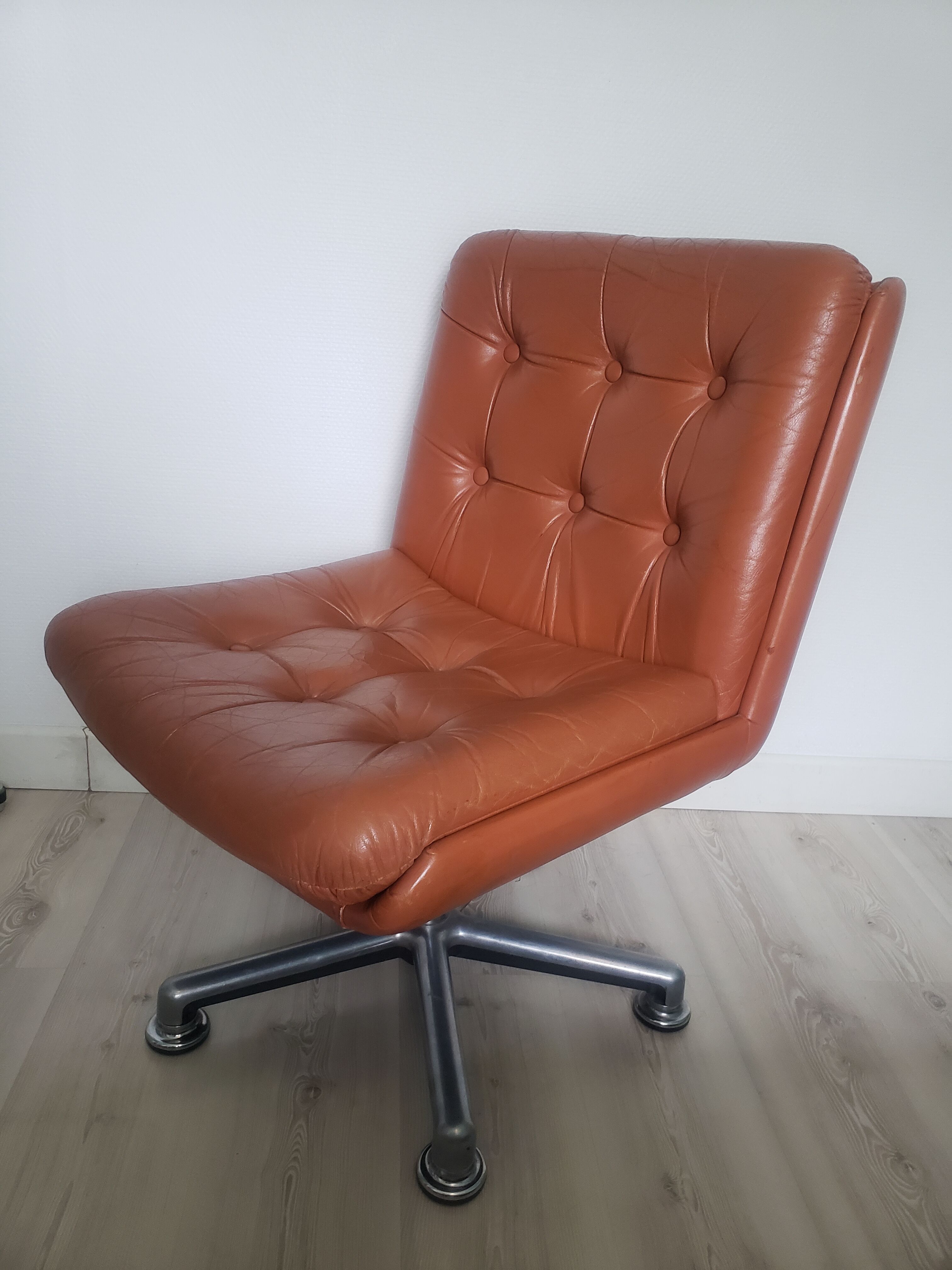 Vintage armchair in brown leather
