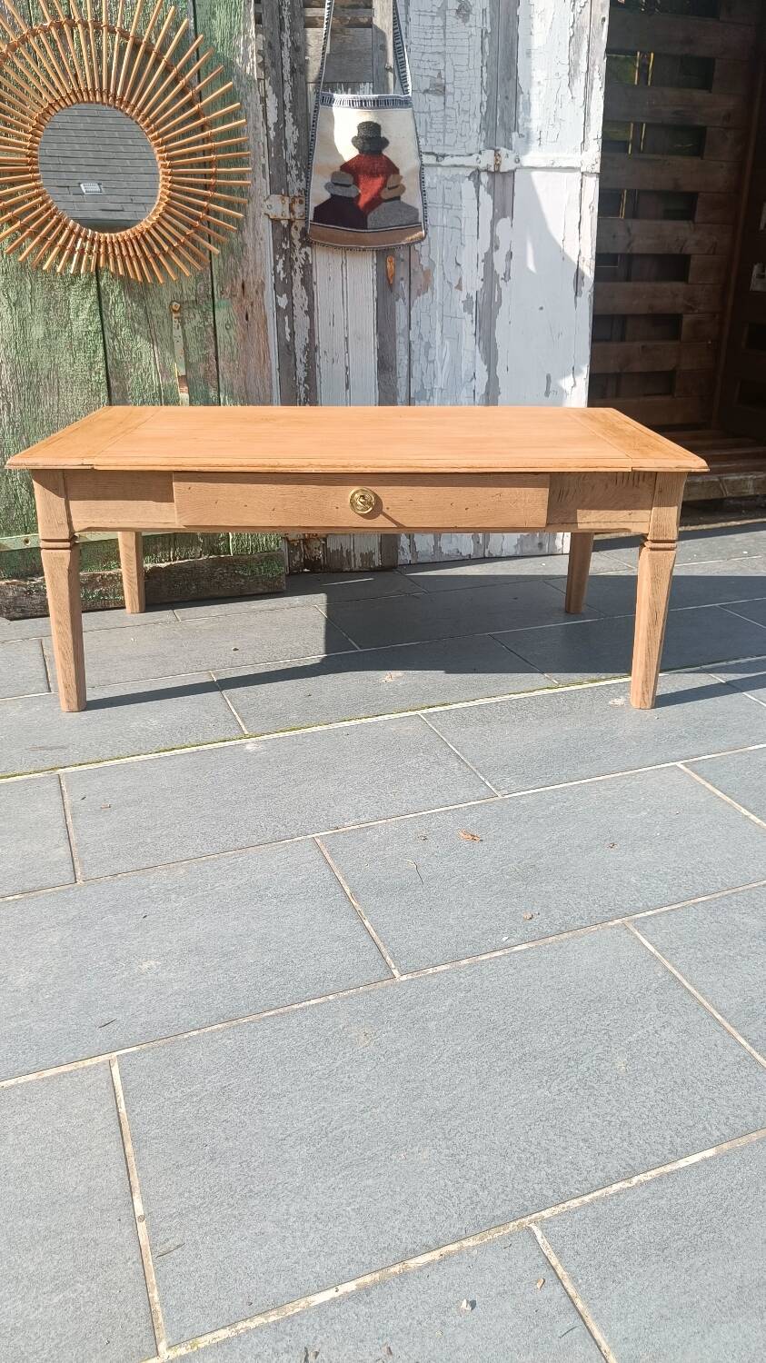 Solid wood coffee table with drawer and original key.