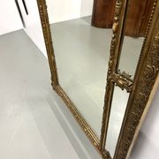 Large antique pediment mirror with mouldings.