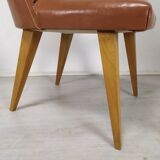 8 brown skai chairs 1950