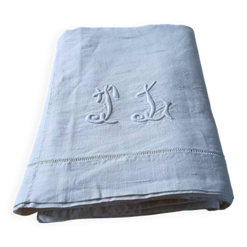 Antique sheet with embroidered initials