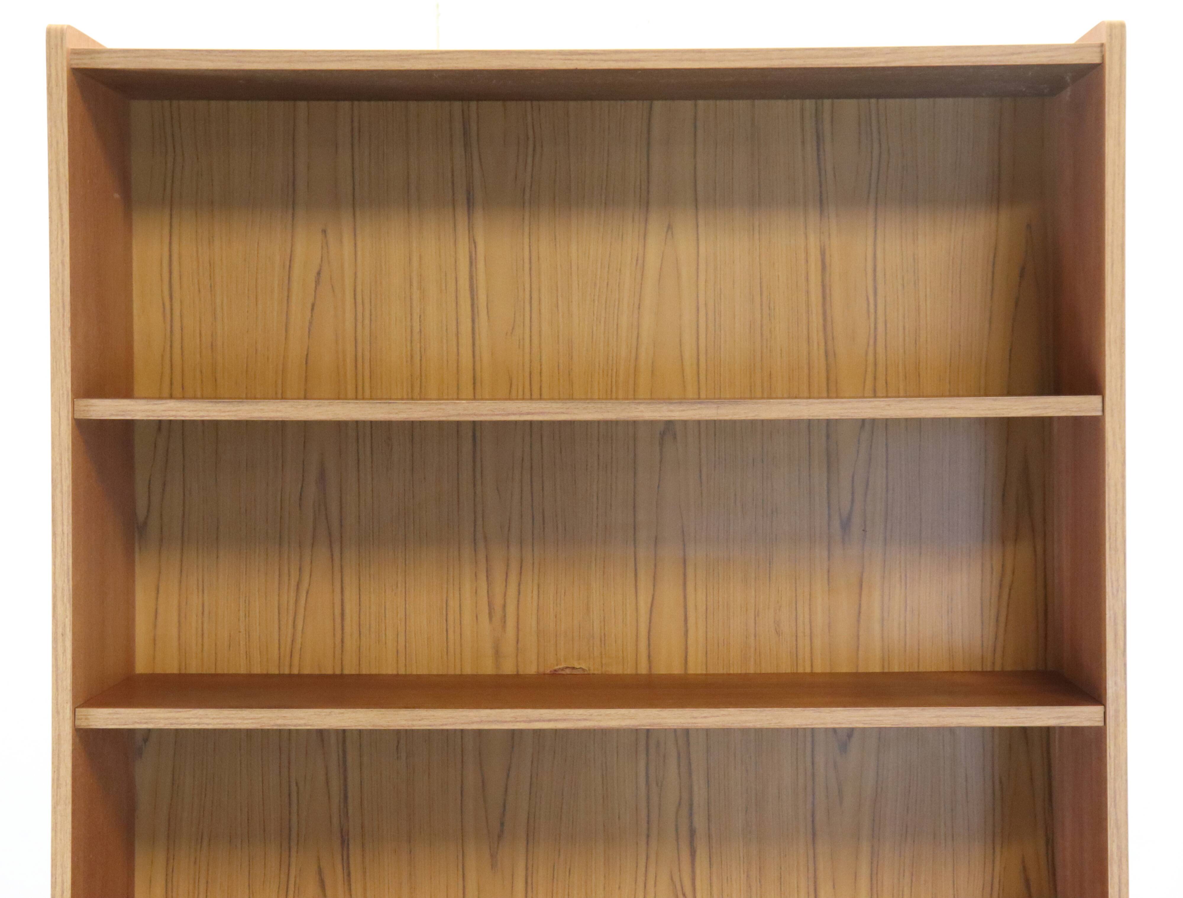 vintage bookcase with full on storage space.