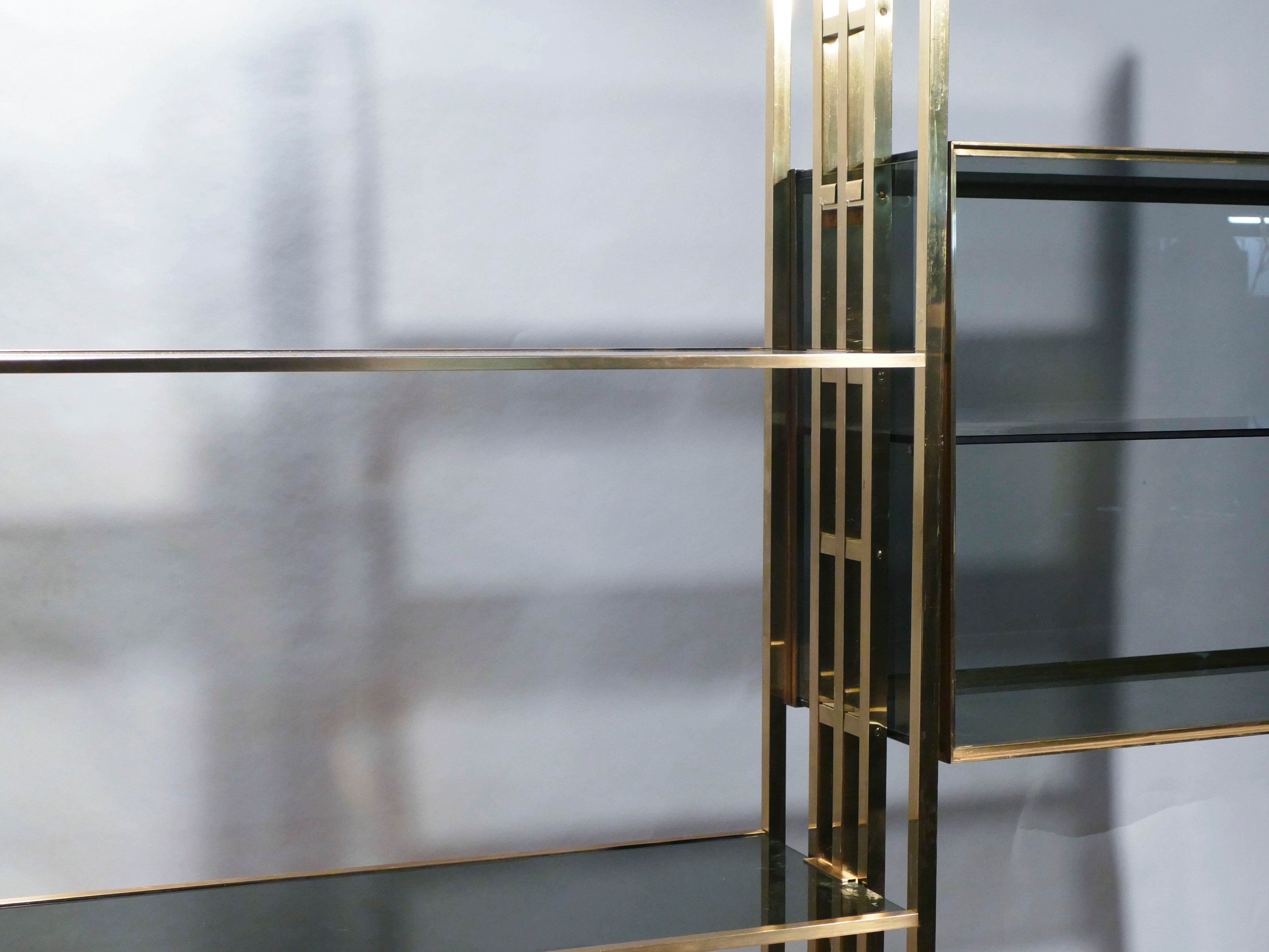 Brass laced library shelf by Kim Moltzer 1970