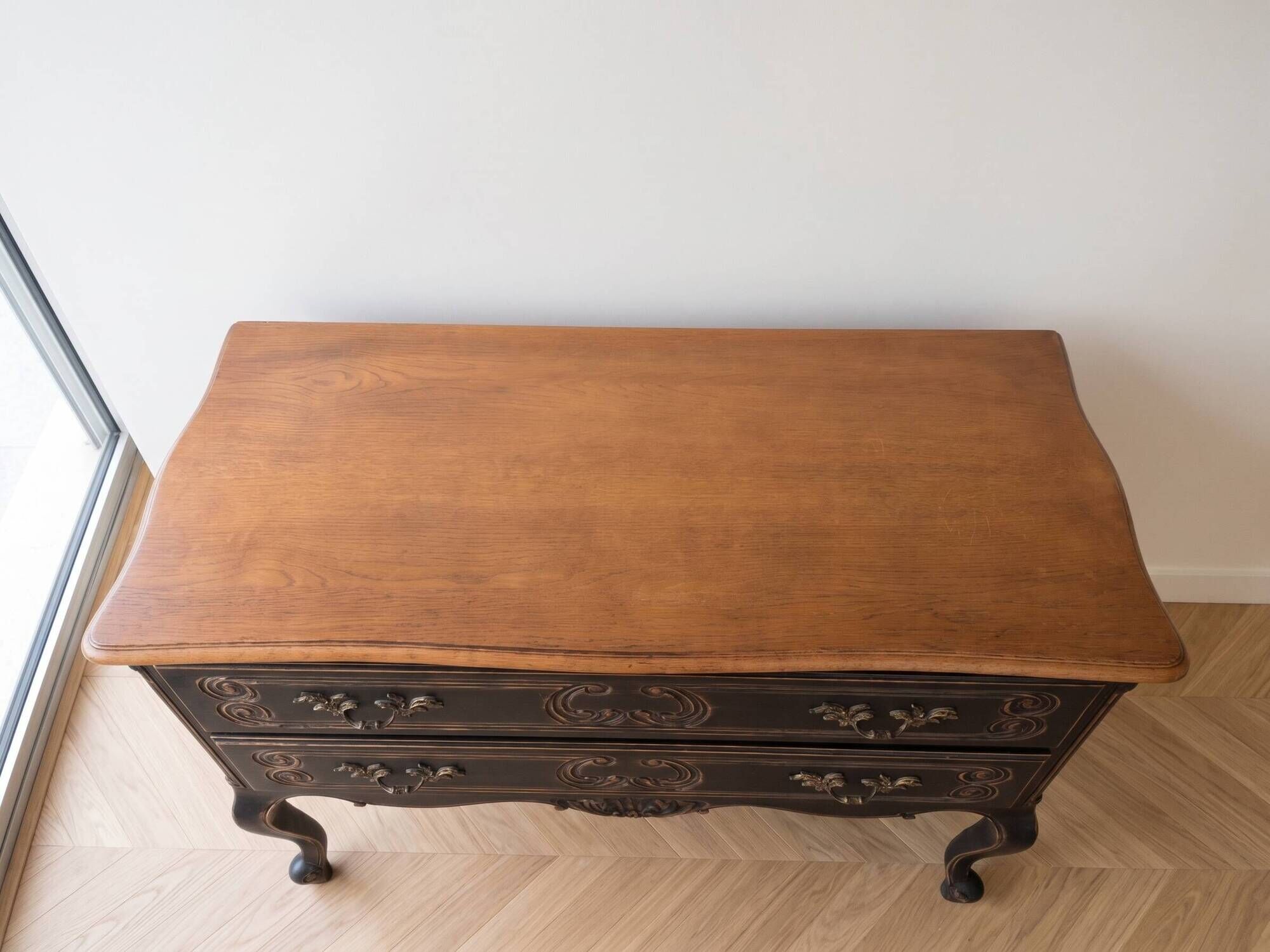 Louis XV black and wood commode