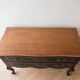 Louis XV black and wood commode