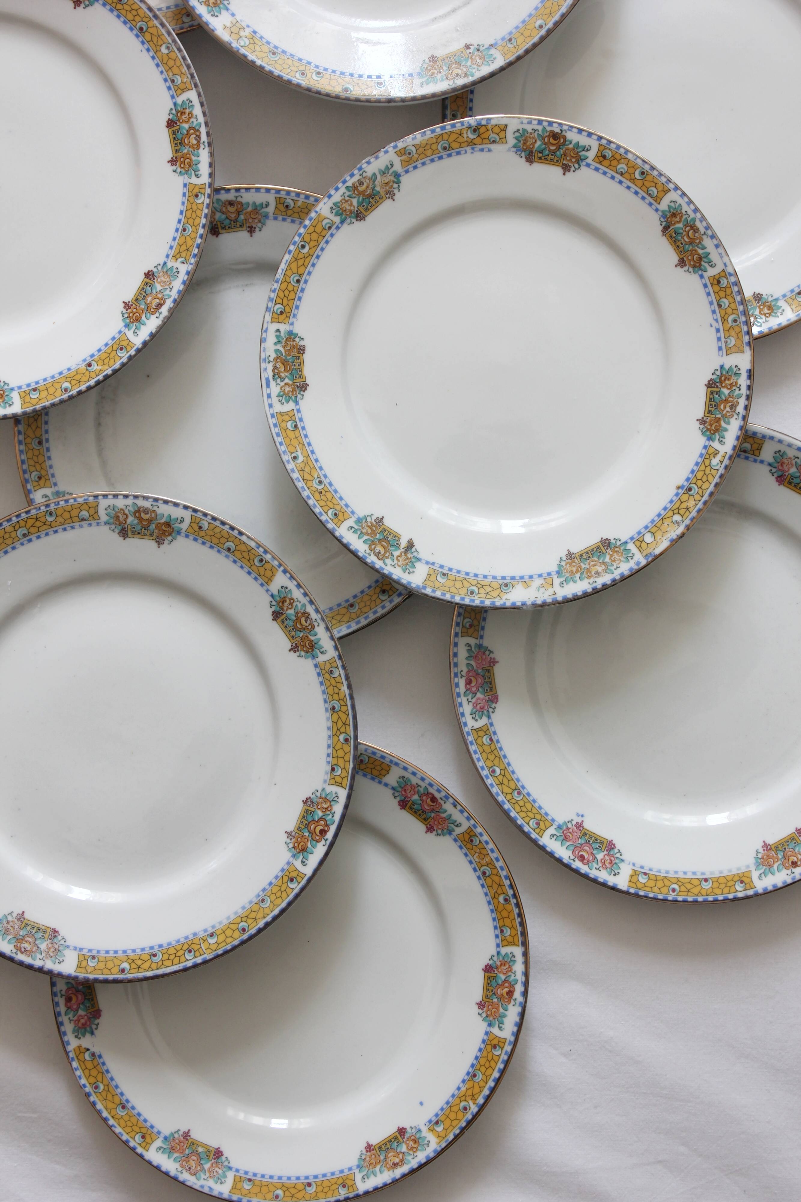 12 vintage porcelain dessert plates