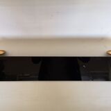 Wall shelf in glass and gold metal