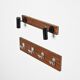 Wall coat rack and lights by Pierre Guariche for La Plagne, around 1968.