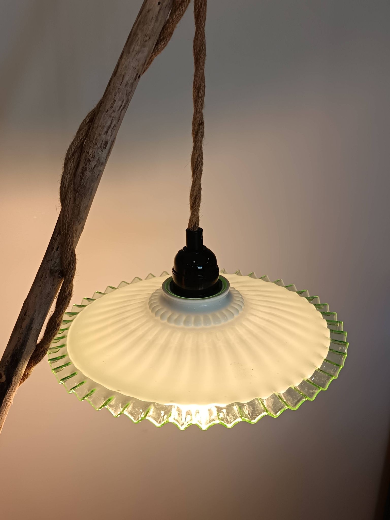 Portable lamp with green and white glass suspension