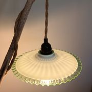 Portable lamp with green and white glass suspension